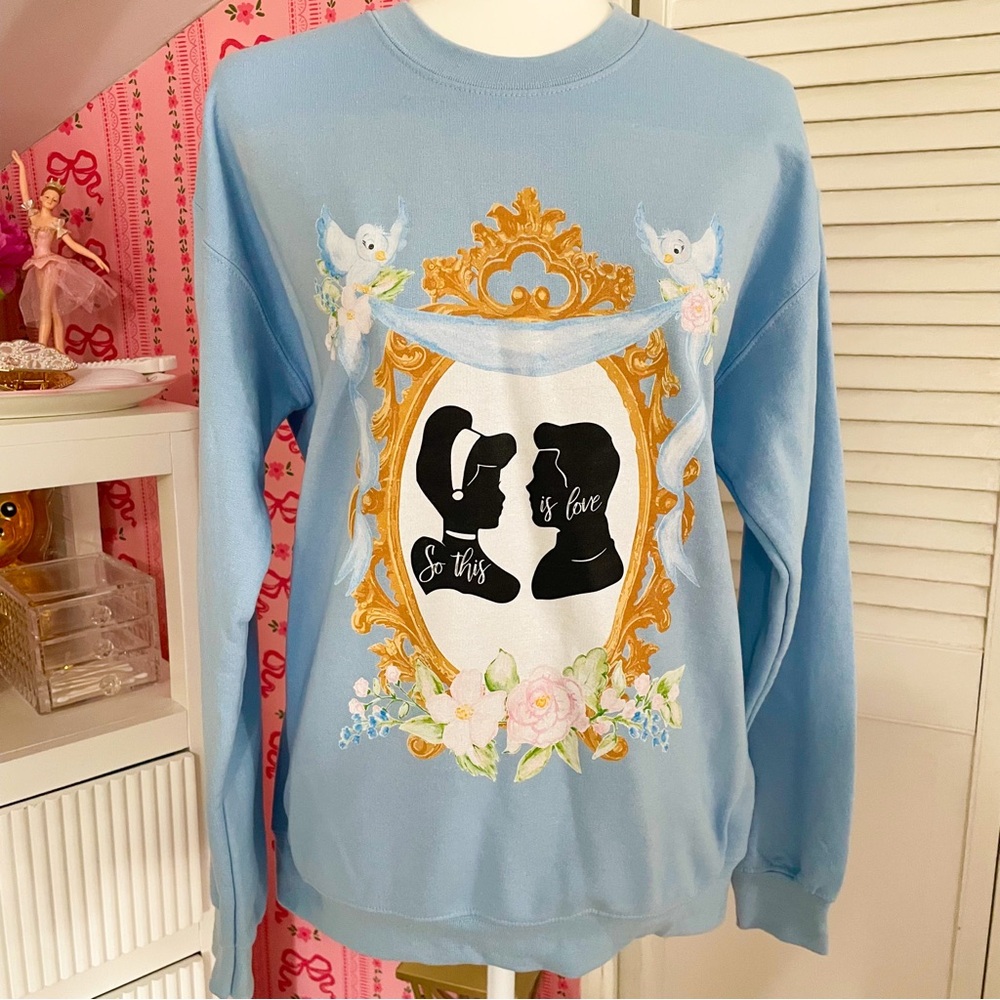 Blue Sweatshirt with Gold and White Design